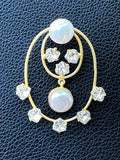 Oval shaped earring with Pearls and Zircons