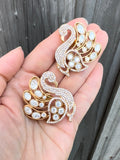 Swan studs oversized