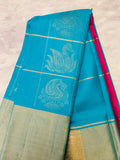Ferozy & Magenta silk Saree with gold zari swans